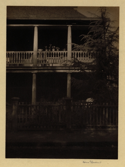 2-story porch with flower pots, Charleston, SC