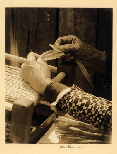 Mrs. Lucy Lakes, Hands of elderly woman making seat of chair