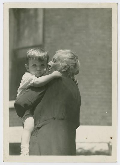 David Neville Devary and Linda Neville by the Neville residence at 722 W. Main St. in August 1938