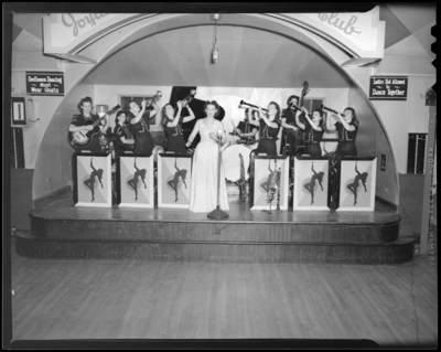 Herb Cook’s Orchestra; Betty Coed and the Debs; Joyland Club,                             interior, members performing on stage