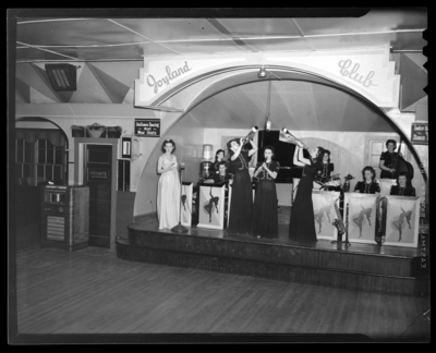 Herb Cook’s Orchestra; Betty Coed and the Debs; Joyland Club,                             interior, members performing on stage