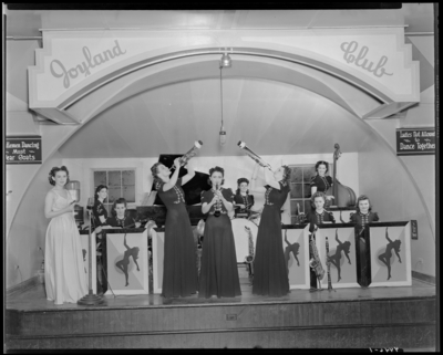 Herb Cook’s Orchestra; Betty Coed and the Debs; Joyland Club,                             interior, members performing on stage