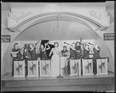 Herb Cook’s Orchestra; Betty Coed and the Debs; Joyland Club,                             interior, members performing on stage