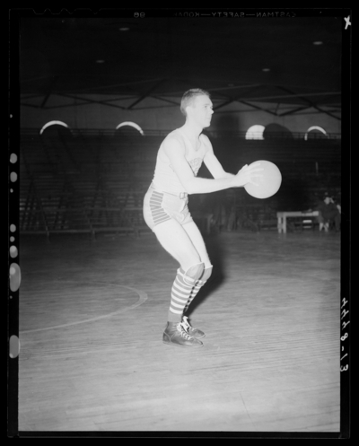 Varsity Basketball, (1940 Kentuckian) (University of Kentucky);                             interior, individual player on the court