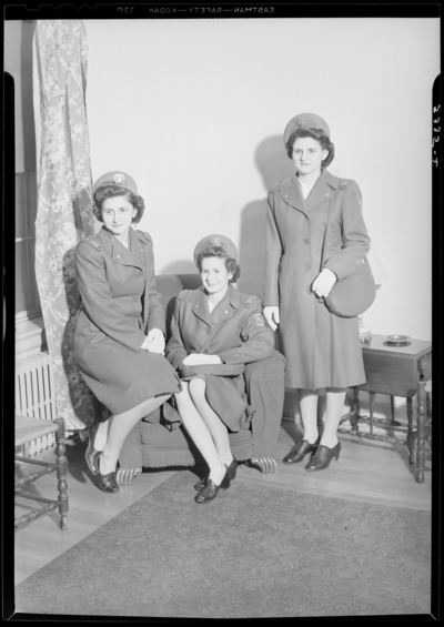 Nurse Aid; Good Samaritan Hospital, 310-330 South Limestone;                             three women gathered around a chair