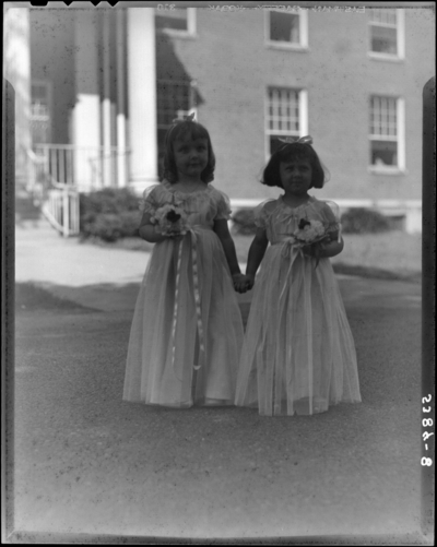 St. Joseph's Hospital, 544 West Second (2nd) Street; Cadet                             Nurses (graduation); exterior; two young girls holding                             flowers