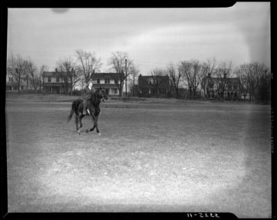 Georgetown College; woman on horseback