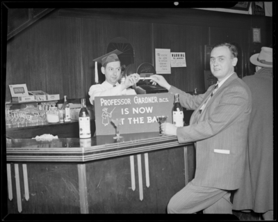 Keith’s Bar, 129 East Main; interior; bartender serving                             customers; bottles of 