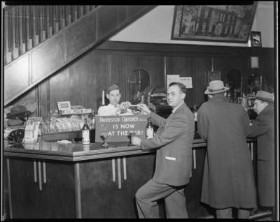 Keith’s Bar, 129 East Main; interior; bartender serving                             customers; bottles of 