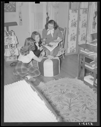 Georgetown College; girls standing in bedroom