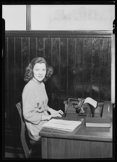 Georgetown College; Fredo Kaszer; woman typing at                             desk