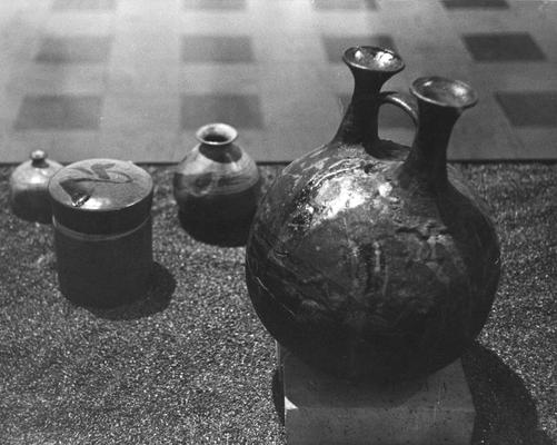 Four ceramic pots by John Tuska. Two of the pots have lids