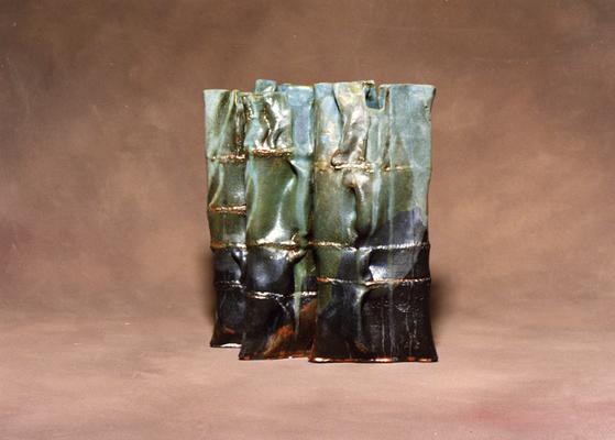 Three ceramic pouch vessels by John Tuska