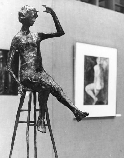 A bronze figure sculpture entitled 