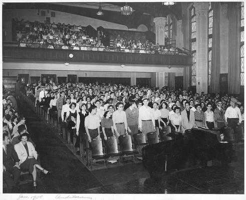 An image of John Tuska and his classmates of the New York High School of Music and Art in an auditorium