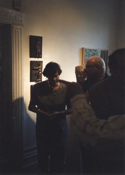 A image of unidentified persons viewing artwork at the Heike Pickett Gallery