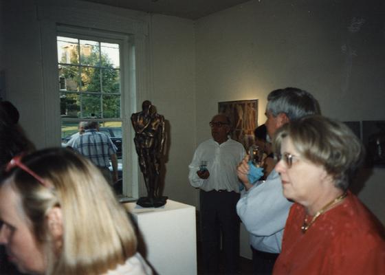 A image of unidentified persons viewing artwork at the Heike Pickett Gallery