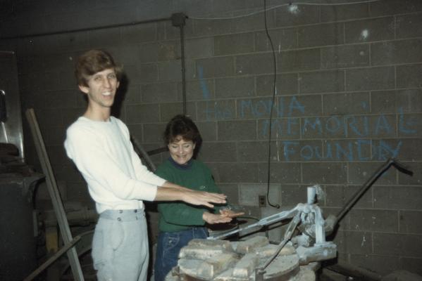 Two students by the furnace in John Tuska's foundry class. The photograph was taken by Zig Gierlach